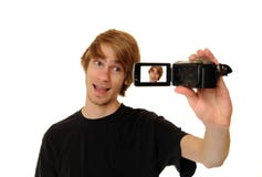 Homem com câmara de vídeo de HD foto de stock Homem com câmara de vídeo de HD foto de stock