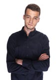 Homem considerável novo em uma camisa escura foto de stock Homem considerável novo em uma camisa escura foto de stock