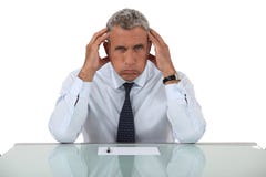 Homem de negócios exasperado imagens de stock royalty free Homem de negócios exasperado imagens de stock royalty free