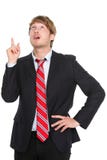 Homem de negócios que tem uma idéia apontar acima fotografia de stock royalty free Homem de negócios que tem uma idéia apontar acima fotografia de stock royalty free