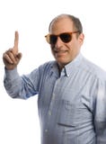 Homem de sorriso com dedo que aponta o número um imagem de stock Homem de sorriso com dedo que aponta o número um imagem de stock