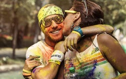 Homem e mulher na corrida Bucareste da cor foto de stock Homem e mulher na corrida Bucareste da cor foto de stock