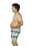 Homem gordo que toca em seu est?mago, homem gordo com uma barriga grande isolada no fundo branco fotos de stock royalty free Homem gordo que toca em seu est?mago, homem gordo com uma barriga grande isolada no fundo branco fotos de stock royalty free