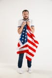 Homem novo com a bandeira do Estados Unidos da América fotos de stock royalty free Homem novo com a bandeira do Estados Unidos da América fotos de stock royalty free