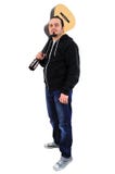 Homem novo com guitarra acústica Fotografia de Stock Homem novo com guitarra acústica Fotografia de Stock