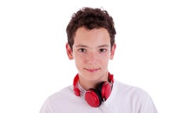 Homem novo que está de escuta a música no auscultadores imagens de stock royalty free Homem novo que está de escuta a música no auscultadores imagens de stock royalty free