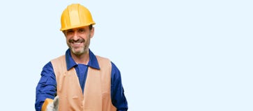 Homem superior considerável isolado sobre o fundo azul imagem de stock Homem superior considerável isolado sobre o fundo azul imagem de stock
