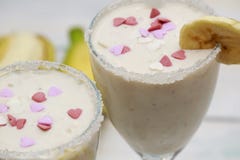 Homemade Banana smoothies or cocкtail on wood table royalty free stock image Homemade Banana smoothies or cocкtail on wood table royalty free stock image