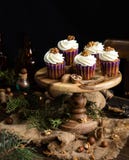 Homemade Carrot Or Pumpkin Cupcakes With White Cream And Walnut On Top Stock Photography Homemade Carrot Or Pumpkin Cupcakes With White Cream And Walnut On Top Stock Photography