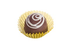 Homemade chocolate truffle. Overhead of candy ball in white bac stock image Homemade chocolate truffle. Overhead of candy ball in white bac stock image
