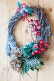 Homemade Christmas wreath closeup on the front wooden door stock images Homemade Christmas wreath closeup on the front wooden door stock images