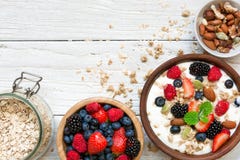 Homemade Granola With Greek Yogurt, Nuts And Fresh Berries In A Bowl With Cereal In Ja Stock Photos Homemade Granola With Greek Yogurt, Nuts And Fresh Berries In A Bowl With Cereal In Ja Stock Photos