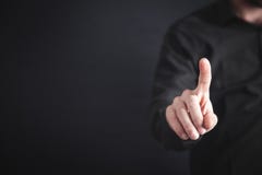 Homme d'affaires dirigeant ou touchant le doigt dans l'?cran image libre de droits Homme d'affaires dirigeant ou touchant le doigt dans l'?cran image libre de droits