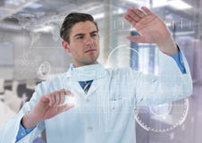 Homme dans le manteau de laboratoire derrière le graphique blanc et fusée contre l'interface blanche et le laboratoire trouble photos stock Homme dans le manteau de laboratoire derrière le graphique blanc et fusée contre l'interface blanche et le laboratoire trouble photos stock