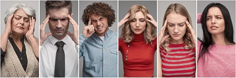 Hommes soumis à une contrainte et femmes ayant le mal de tête image stock Hommes soumis à une contrainte et femmes ayant le mal de tête image stock