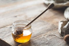 Honey and honey dipper stock photos Honey and honey dipper stock photos