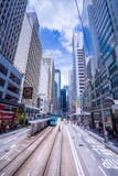 Hong Kong tramways, Hong Kong`s trams run in two directions -- east and west. Passengers lean back as a Hong Kong tram stock photos Hong Kong tramways, Hong Kong`s trams run in two directions -- east and west. Passengers lean back as a Hong Kong tram stock photos