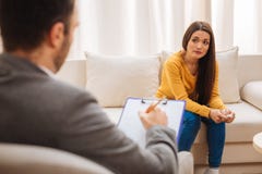 Hopeless female patient expressing her thoughts royalty free stock photo Hopeless female patient expressing her thoughts royalty free stock photo