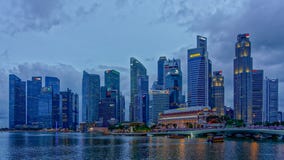 Hora céntrica del azul de Singapur fotos de archivo libres de regalías Hora céntrica del azul de Singapur fotos de archivo libres de regalías