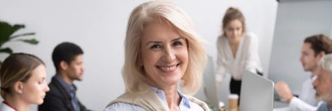Horizontal photo portrait of senior businesswoman smiling looking at camera royalty free stock photo Horizontal photo portrait of senior businesswoman smiling looking at camera royalty free stock photo