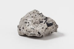 Hornblende ore on white background Is a complex inosilicate series of minerals ferrohornblende – magnesiohornblende it is really stock photos Hornblende ore on white background Is a complex inosilicate series of minerals ferrohornblende – magnesiohornblende it is really stock photos