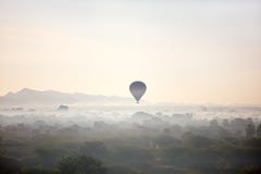 Hot air balloons fly over Bagan