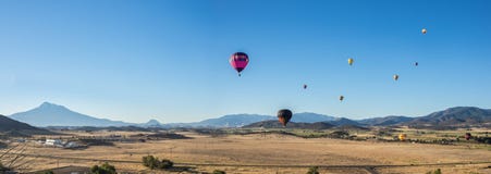 Hot air balloons over fields with Mt. Shasta Stock Photos Hot air balloons over fields with Mt. Shasta Stock Photos