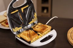 Hot sandwiches in a sandwich maker royalty free stock photos Hot sandwiches in a sandwich maker royalty free stock photos