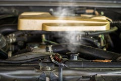 Hot steam coming out of Radiator, Car engine over heat Royalty Free Stock Images Hot steam coming out of Radiator, Car engine over heat Royalty Free Stock Images