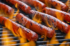 Hotdogs On A Flaming Hot Barbecue Grill Royalty Free Stock Photo Hotdogs On A Flaming Hot Barbecue Grill Royalty Free Stock Photo