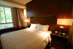 Hotel bedroom interior with double bed