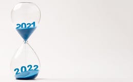 Hourglass with blue sand for change 2021 to 2022 year , Countdown and preparation merry Christmas and happy new year concept