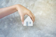 House in hand close-up.on bright background stock image House in hand close-up.on bright background stock image