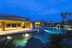 House With Pool In Backyard At Dusk Stock Photos House With Pool In Backyard At Dusk Stock Photos