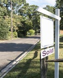 For sale sign with a sold sign on a corner royalty free stock images For sale sign with a sold sign on a corner royalty free stock images