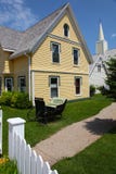 House With Yellow Siding Stock Images