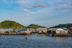 houses on stilts in Yellu village at sunset