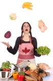 Housewife Juggling With Fruit And Vegetables Stock Photography