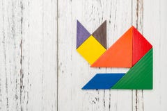 Houten die tangram als vos wordt gevormd Stock Afbeelding Houten die tangram als vos wordt gevormd Stock Afbeelding