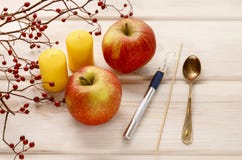 How to make apple and wild rose candle holders Stock Photo How to make apple and wild rose candle holders Stock Photo