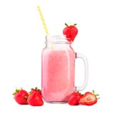 A huge mason jar with handle and yellow straw full of pink milkshake with strawberries, on a white background. stock image A huge mason jar with handle and yellow straw full of pink milkshake with strawberries, on a white background. stock image