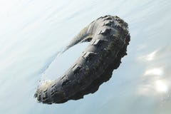 Huge wheel floats on water sea royalty free stock image Huge wheel floats on water sea royalty free stock image