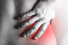 Human suffering from backache. stock photos Human suffering from backache. stock photos