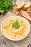 Hummus With Pine Nuts In A Bowl, Vertical, Top View Stock Photos Hummus With Pine Nuts In A Bowl, Vertical, Top View Stock Photos