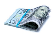Hundred dollar bills are bent in half with rubber band. stock photo Hundred dollar bills are bent in half with rubber band. stock photo