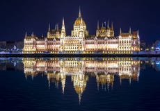 Hungarian Parliament Building at night with reflection in Danube river, Budapest, Hungary royalty free stock photography Hungarian Parliament Building at night with reflection in Danube river, Budapest, Hungary royalty free stock photography