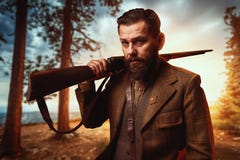 Hunter in vintage hunting clothing with old gun Royalty Free Stock Photo Hunter in vintage hunting clothing with old gun Royalty Free Stock Photo