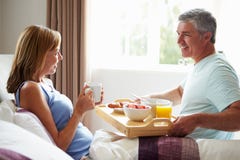 https://thumbs.dreamstime.com/t/husband-bringing-wife-breakfast-bed-tray-looking-each-other-smiling-34155659.jpg