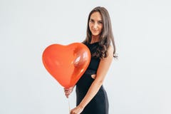 Härlig lycklig ung kvinna på födelsedagferiepartiet arkivfoto Härlig lycklig ung kvinna på födelsedagferiepartiet arkivfoto