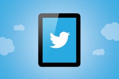 Icône de Twitter sur le PC de Tablette photos libres de droits Icône de Twitter sur le PC de Tablette photos libres de droits